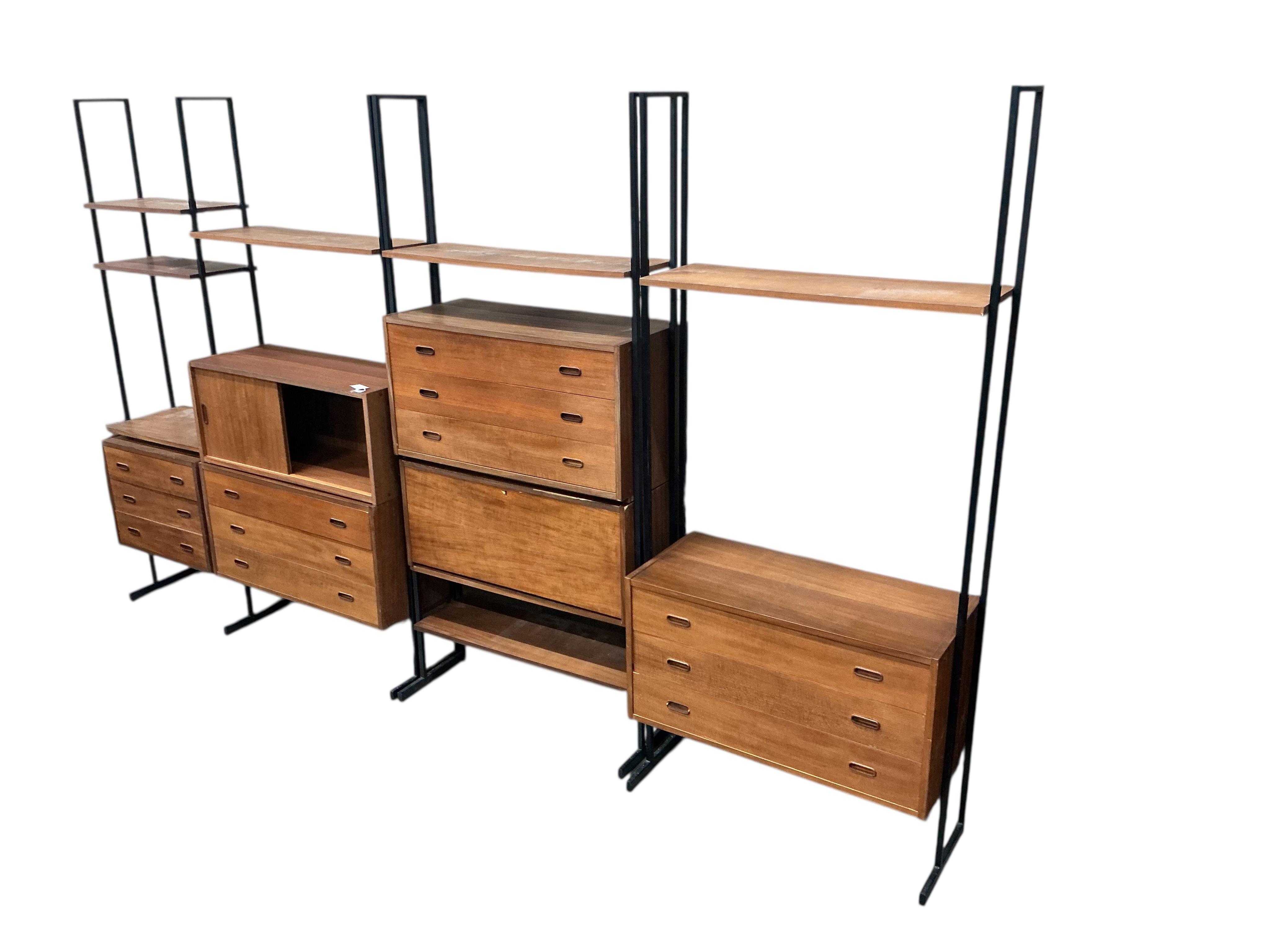A mid century teak Ladderax type wall unit, width 341cm, depth 40cm, height 203cm